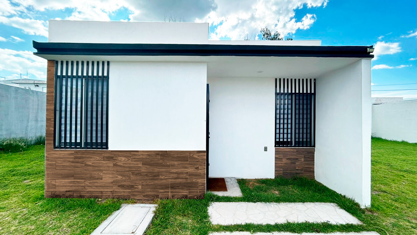 vista de fachada de casa de modelo cipres en desarrollo residencial paseos del bosque en el estado de Aguascalientes Mexico