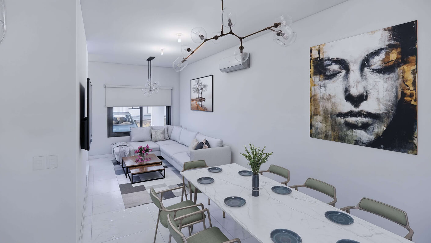 Comedor y sala de un apartamento moderno en la casa modelo Aura, ubicada en Ángeles Residencial, Chihuahua, México.