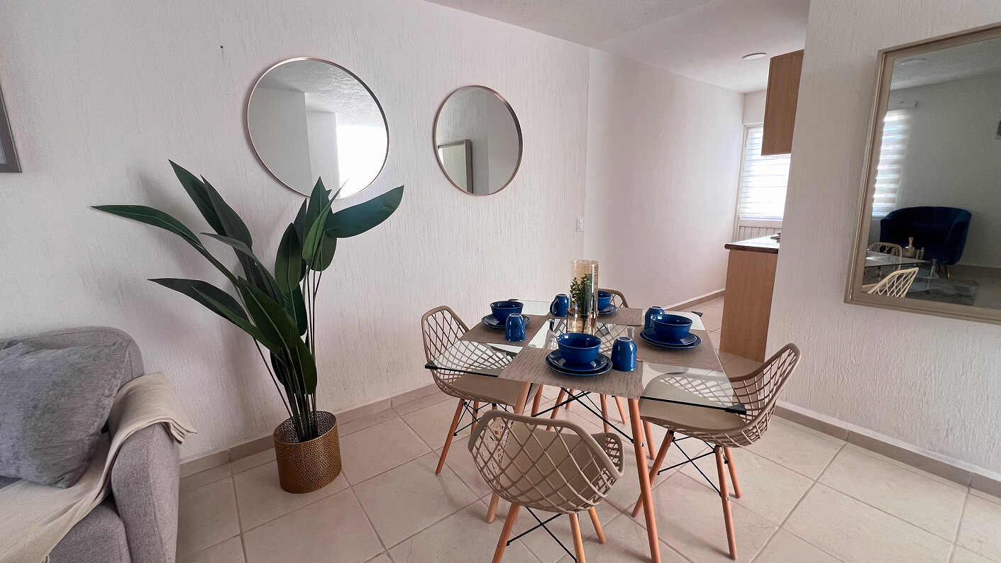 comedor con sillas y platos una planta de decoracion de casa modelo claret en desarrollo residencial paseos de los viñedos en el estado de Aguascalientes Mexico del desarrollo inmobiliario frindsa