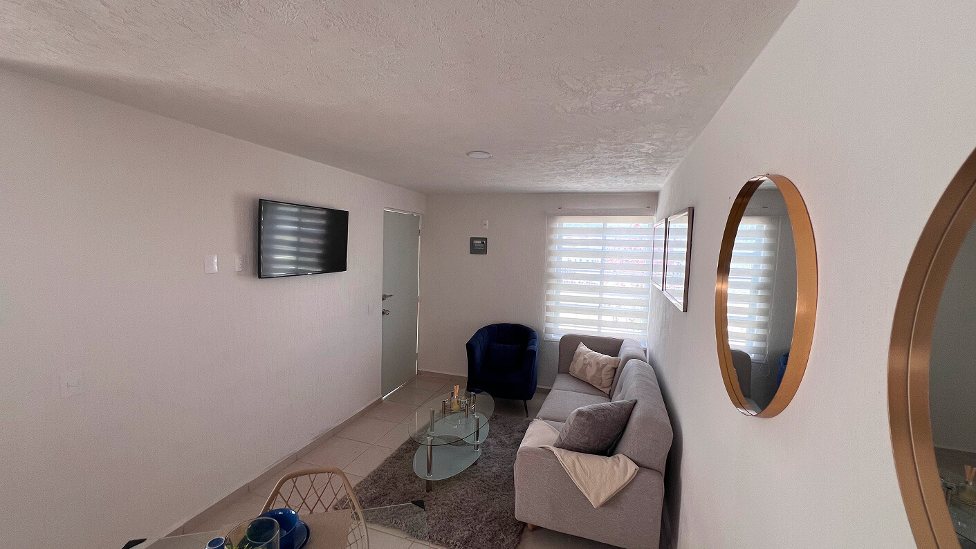 vista panoramica de sala hacia entrada de casa modelo claret en desarrollo residencial paseos de los viñedos en el estado de Aguascalientes Mexico del desarrollo inmobiliario frindsa