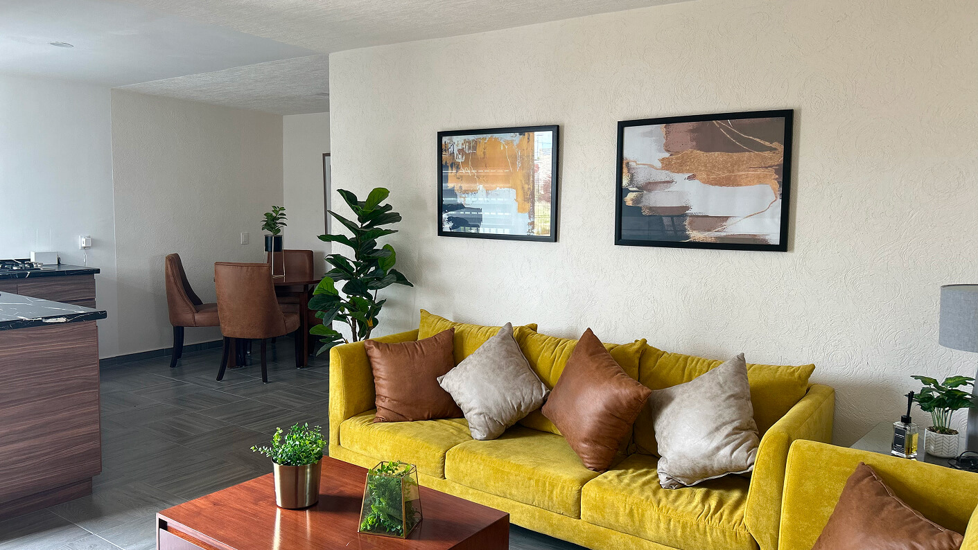 sala mesa de centro comedor cocina de casa modelo sauce en desarrollo paseos del bosque en el estado de Aguascalientes Mexico del desarrollador inmobiliario frindsa