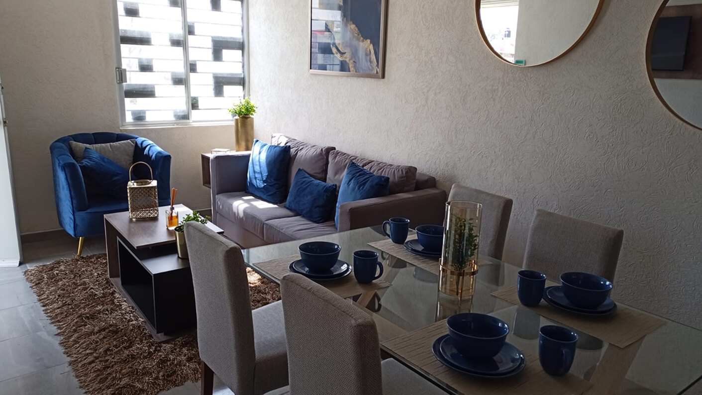 comedor y sala de estar de casa modelo capri en desarrollo residencial paseos de la providencia en el estado de Aguascalientes Mexico del desarrollador inmobiliario frindsa