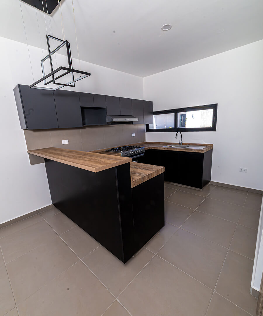 foto cocina elegante de modelo reforma 1 I de desarrollo inmobiliario residencial reforma en el estado de hidalgo pachuca mexico por frindsa desarrollador inmobiliario